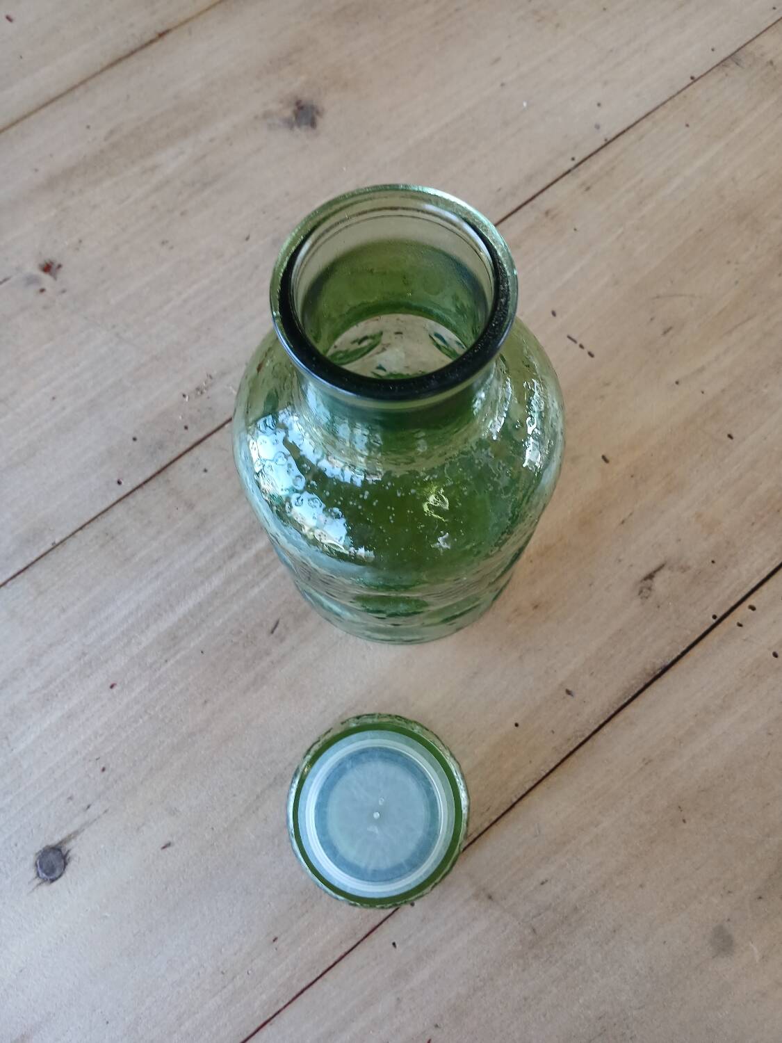 Antique green carafe