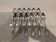 12 silver-plated metal teaspoons with rocaille ribbon decoration, 14.6 cm