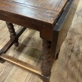 Wooden table with gateleg flaps