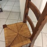 6 Solid oak dining chairs seated in straw
