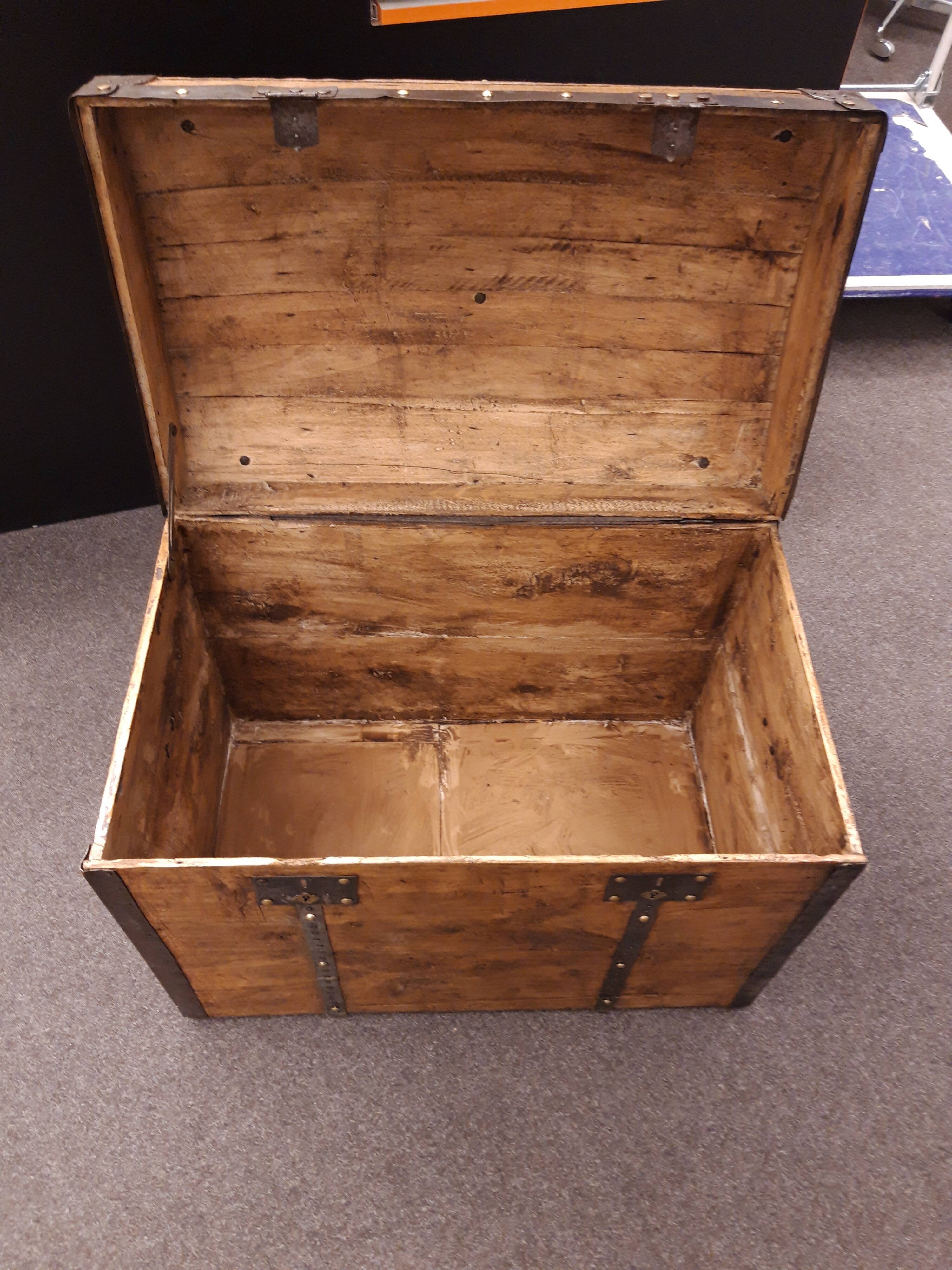 Wooden bulging trunk restored