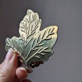 2 golden leaf curtain clips