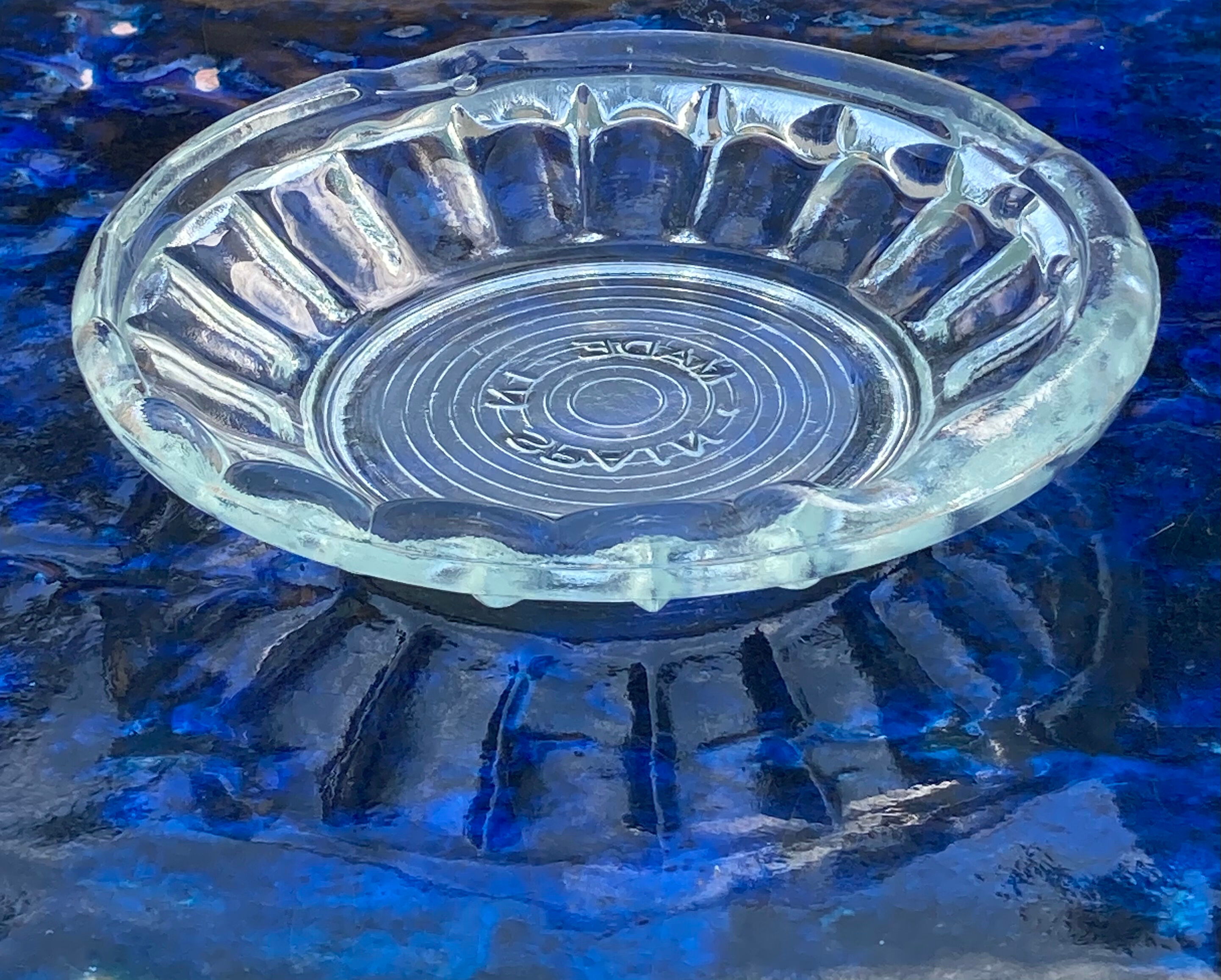 Empty round molded glass pocket