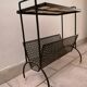 Table carries steel magazines perforated sheet metal vintage ceramic checkerboard