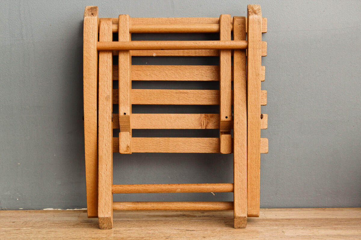 Lathy folding stool made of wood
