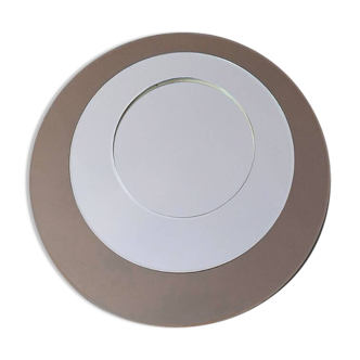 Round brown glass wall mirror attributed to Cristal Art, Italy, 1970s.