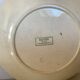 Four old earthenware plates