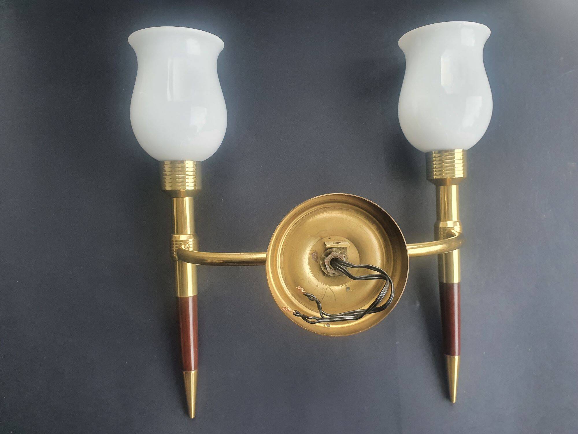 Large wall sconces torch style from the 1950s.