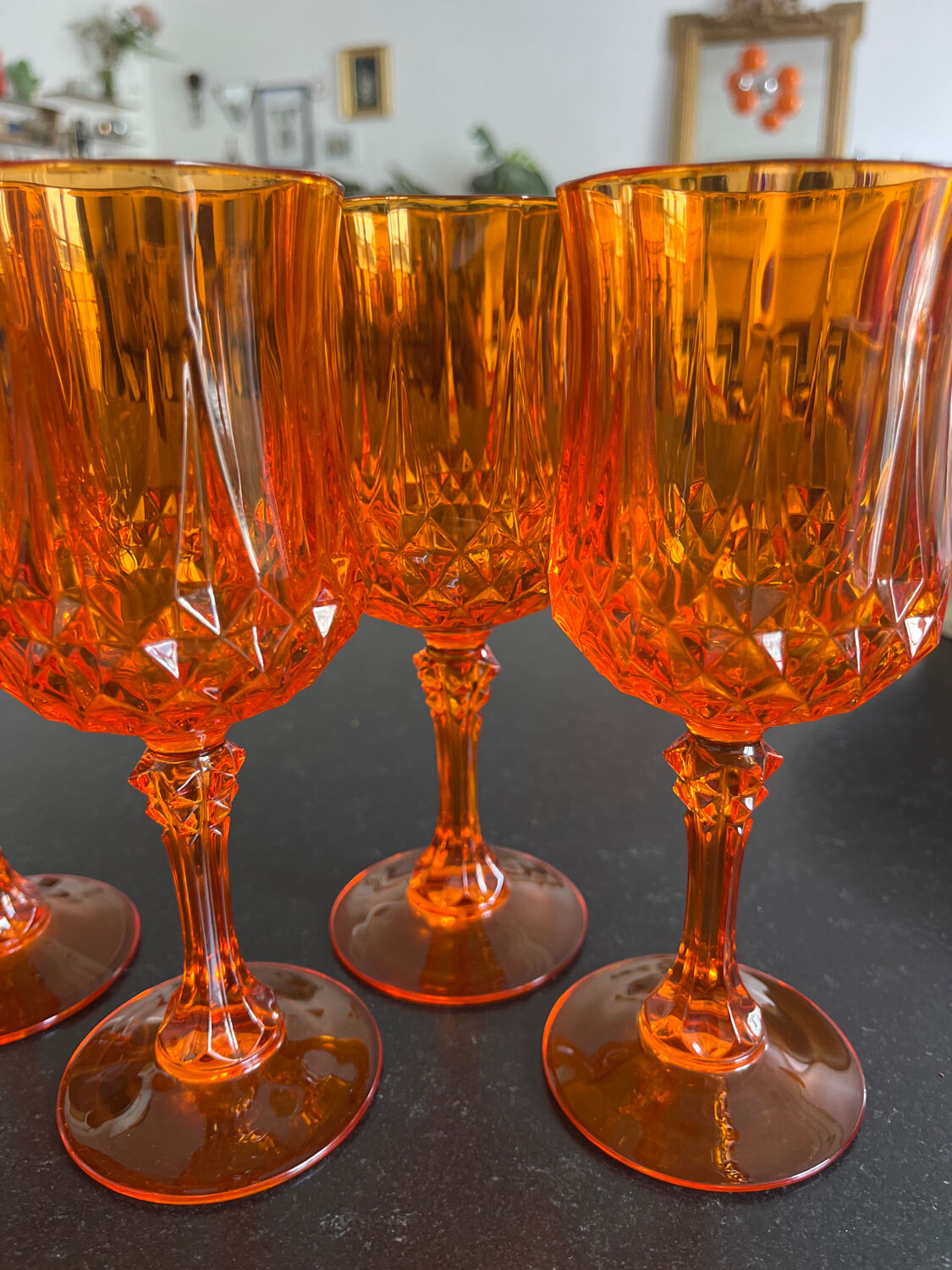 4 orange crystal glasses
