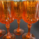 4 orange crystal glasses