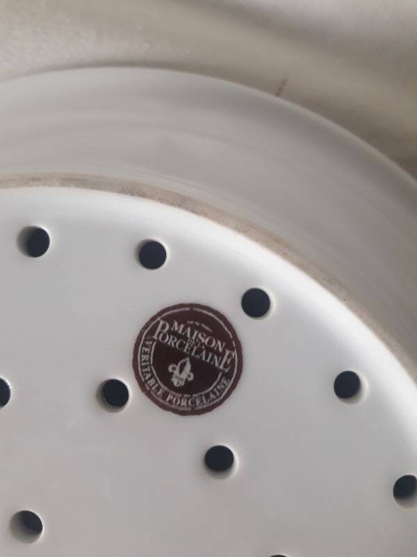 White porcelain drainer and dish