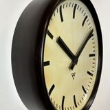 Industrial bakelite factory wall clock from Pragotron, 1960s