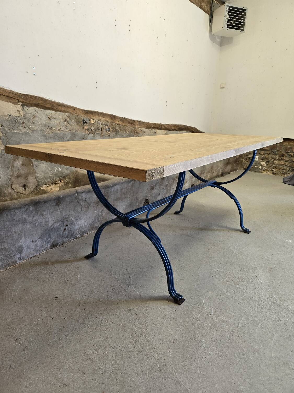 Wrought iron and solid wood table