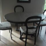 Table with extension cord and 4 chairs in cherry wood