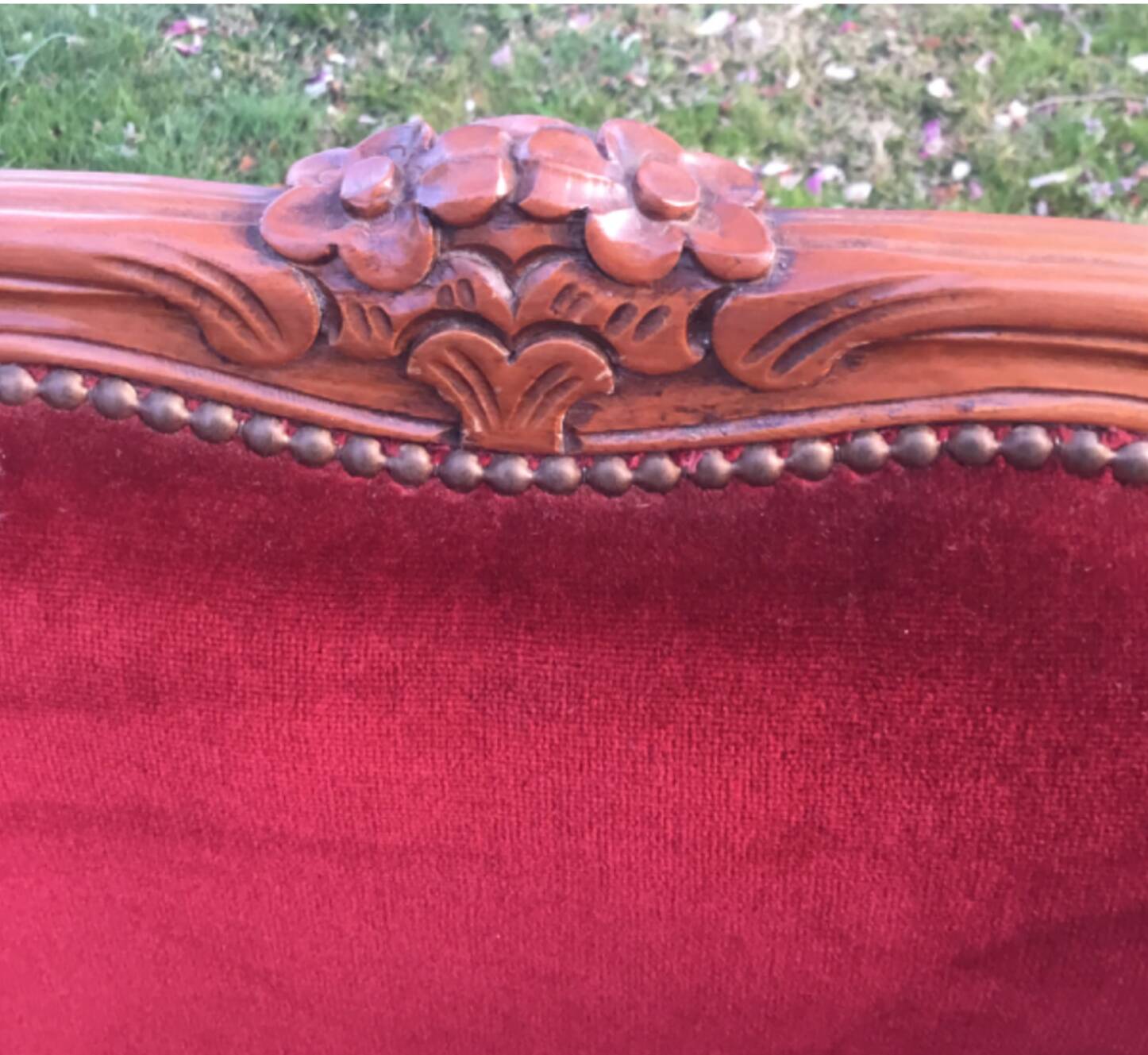 Louis XV style carved wooden shepherdess chair. Red velvet