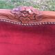 Louis XV style carved wooden shepherdess chair. Red velvet
