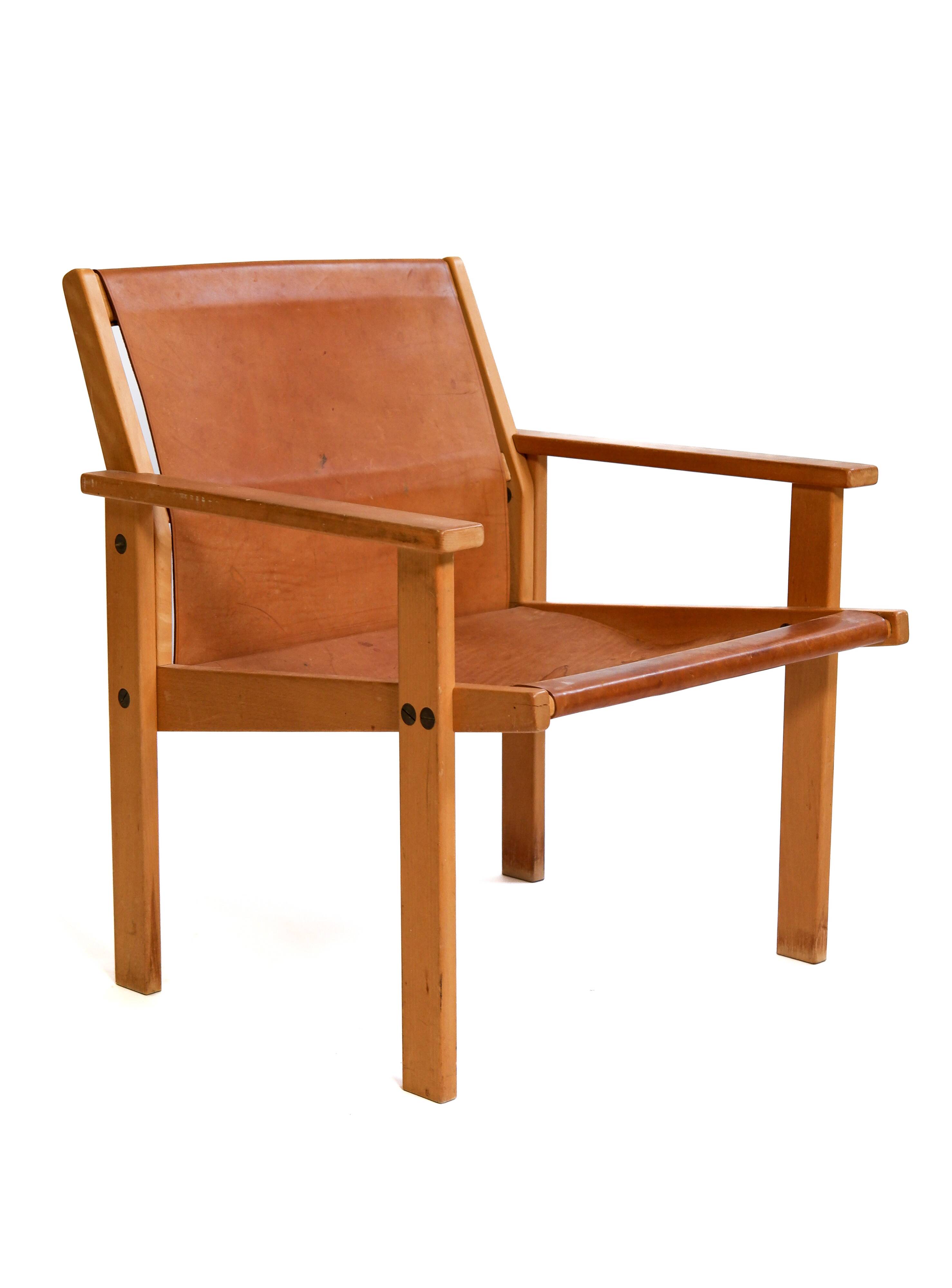 Rare Hans Agne Jakobsson armchair in leather and wood. Circa 1970