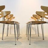 Thonet dining chairs stacked in chrome and beech