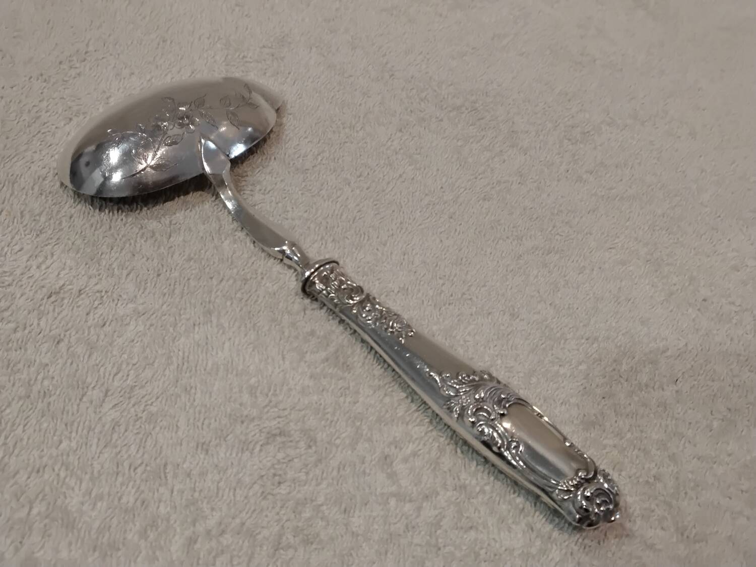 Ladle with a handle, 950 silver Minerva, Rocaille style, Ravinet.