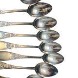 Set of twelve silver plated soup spoons