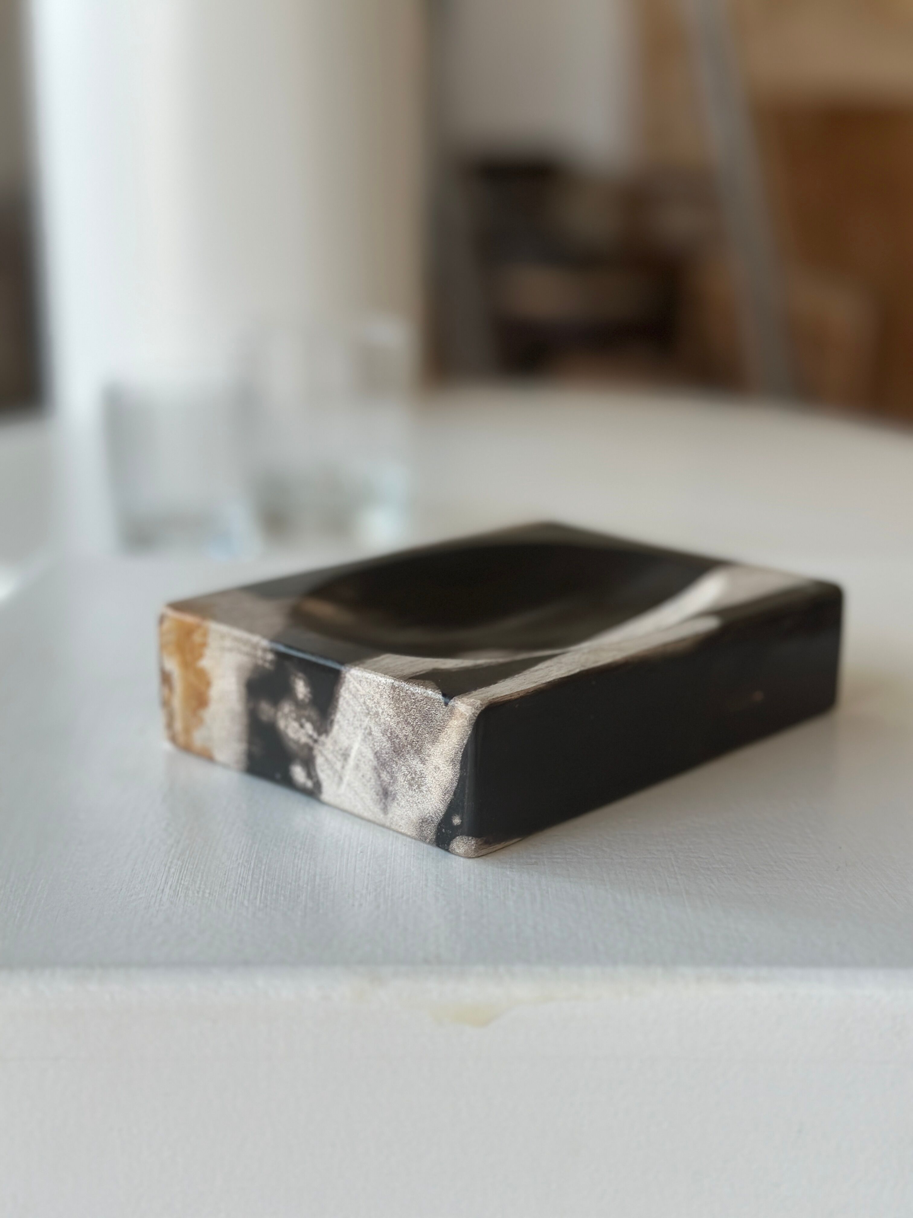 Symmetrical multicolored petrified wood soap dish