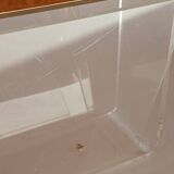 Acrylic magazine rack by David Lange