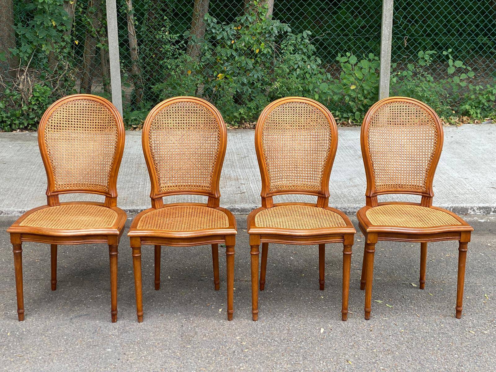 4 caned Louis XVI medallion dining chairs from the 1960s.