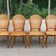 4 caned Louis XVI medallion dining chairs from the 1960s.