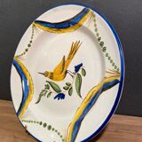 Large earthenware dish signed with bird decoration