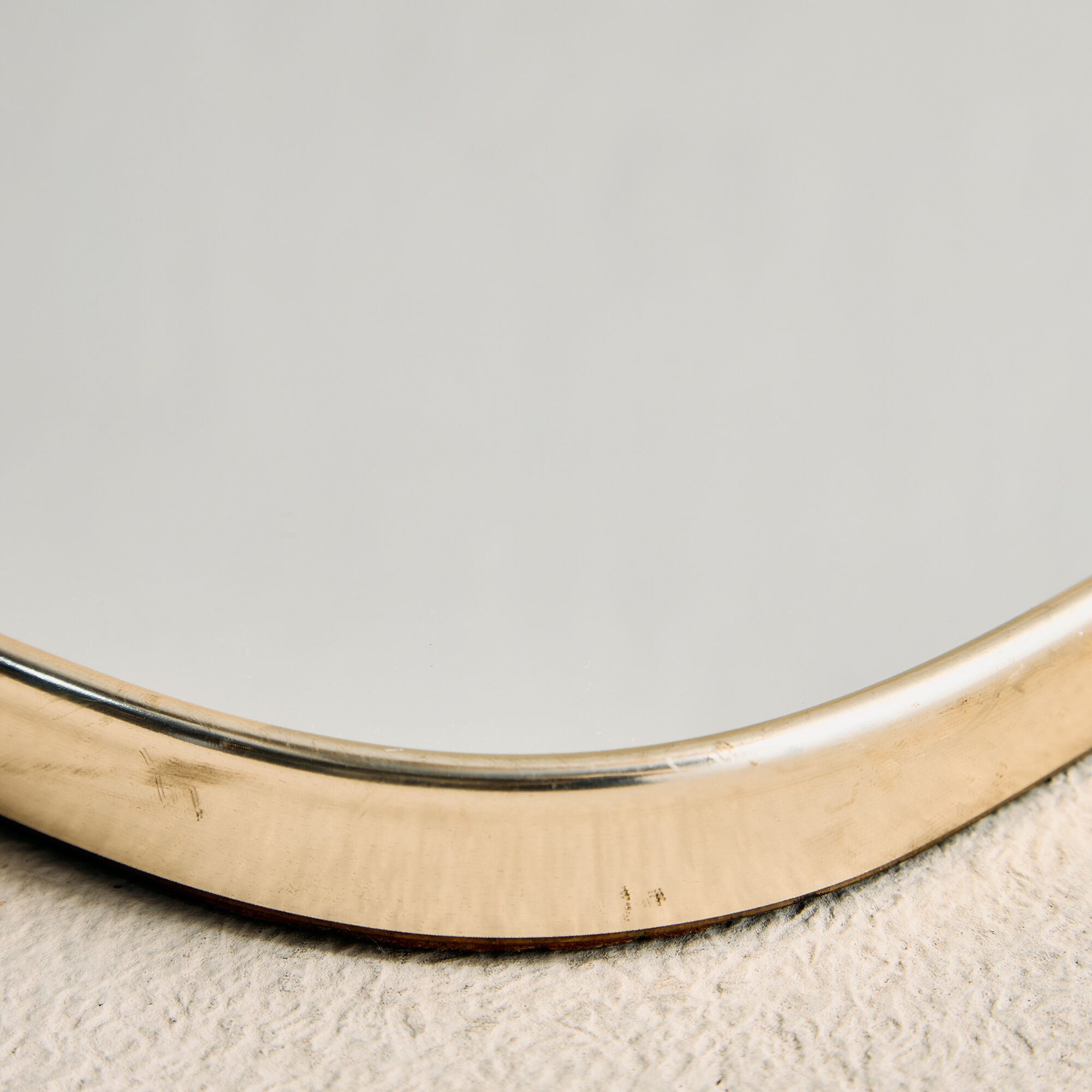 Framed metal mirror