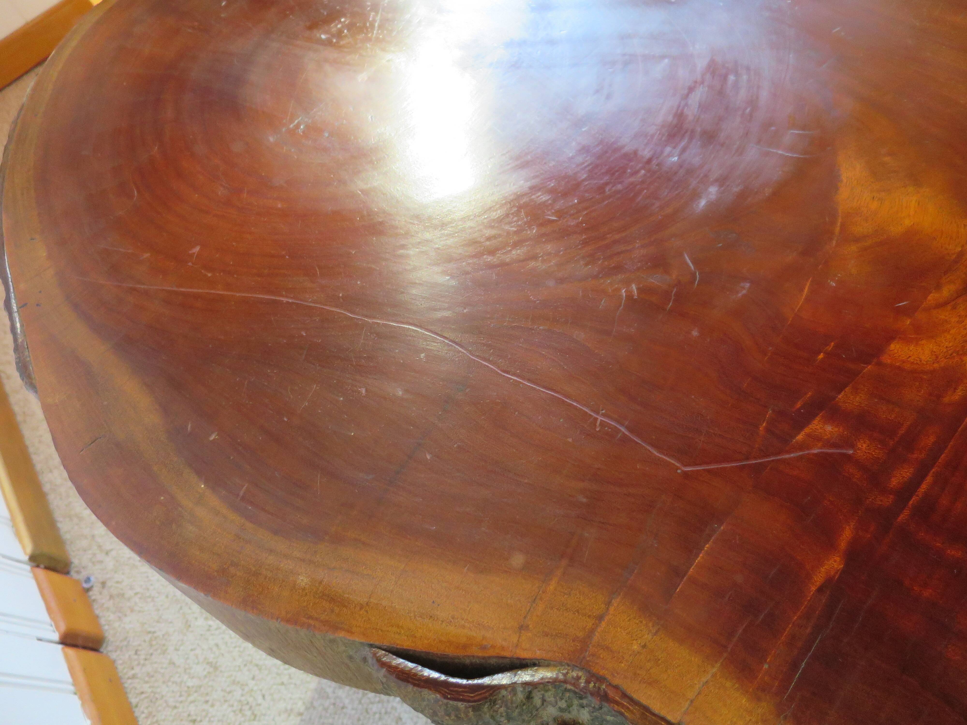 Tripod coffee table - solid okoumé wood - organic shape - brutalist style