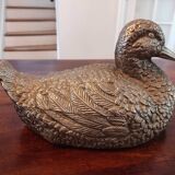 Large silver metal duck