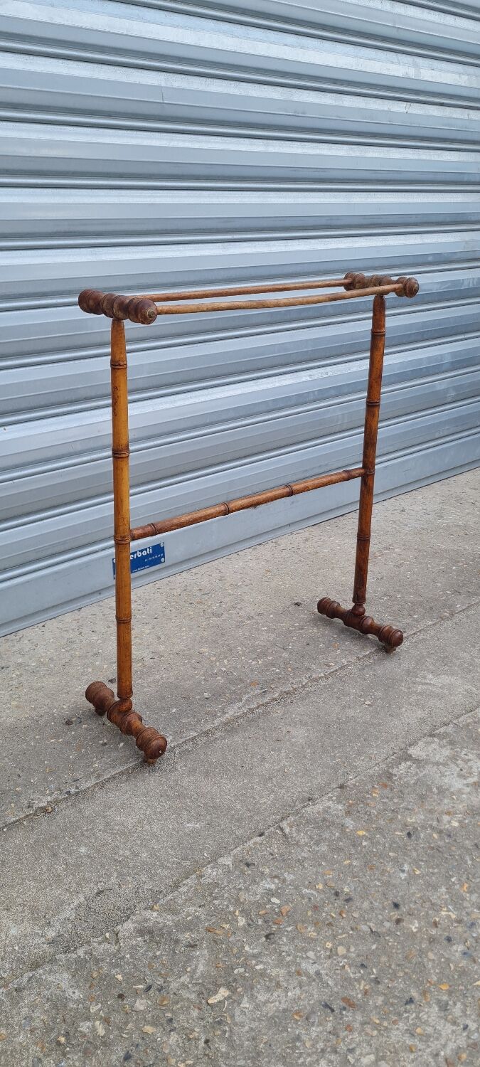 Turned wooden towel rack