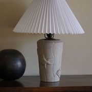 Modern vintage French table lamp, made of stone with fish patterns, 1970s.