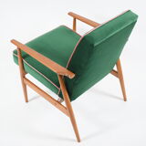 Fauteuil vintage années 1970 velours bouteille verte