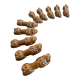 10 ceramic knife holders in the shape of a recumbent poodle