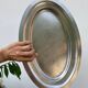 Oval stainless steel dish, signed Rémi Letang