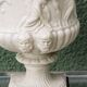 Pair of Medicis Borghese vases in porcelain biscuit and brass.