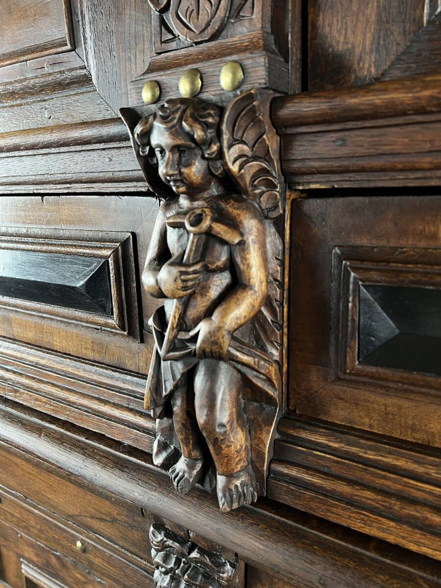 Antique carved wooden buffet in Renaissance style, late 18th / early 19th century.