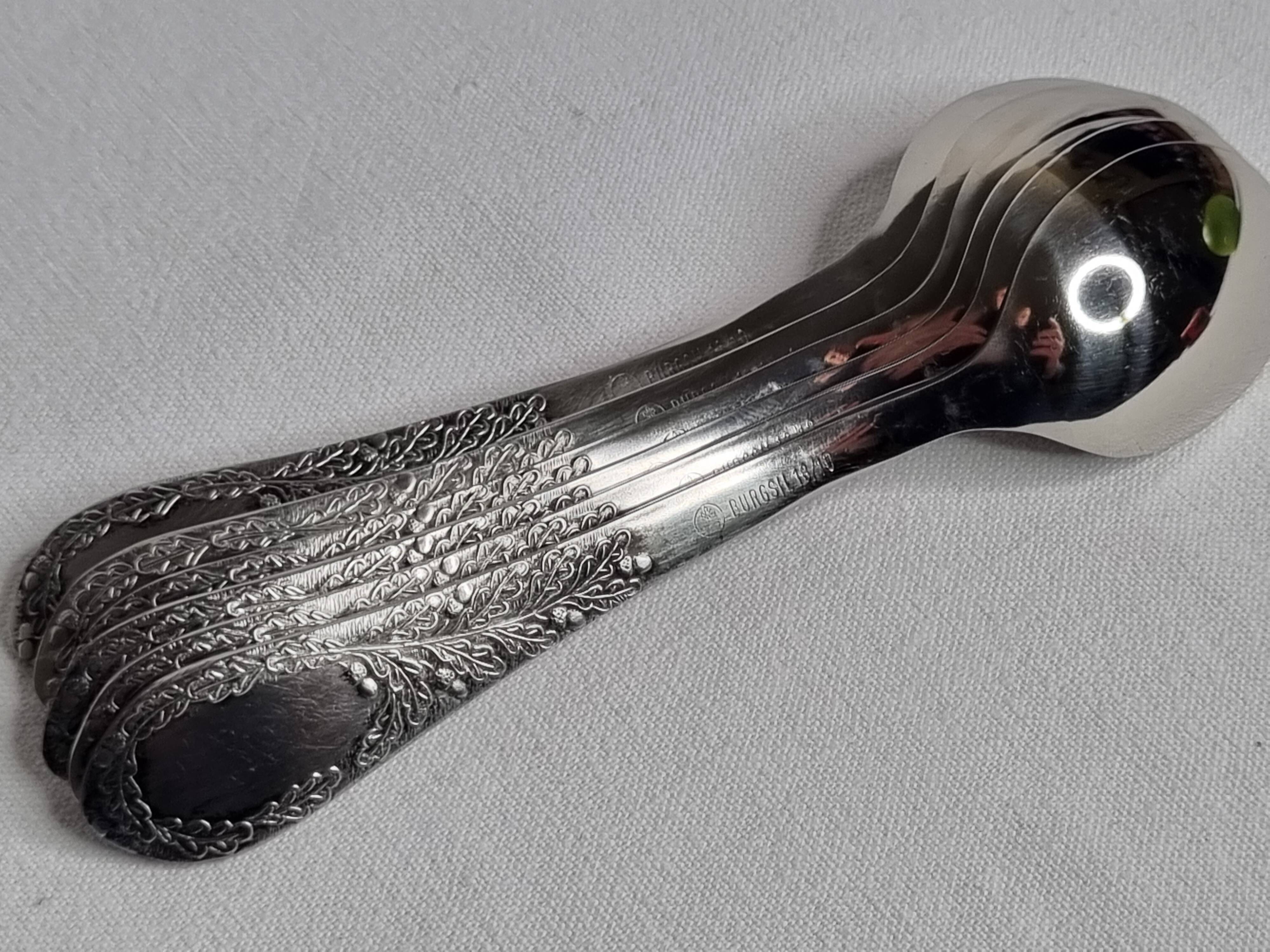 Set of six "Burgsil" stainless steel teaspoons with rabbit decoration