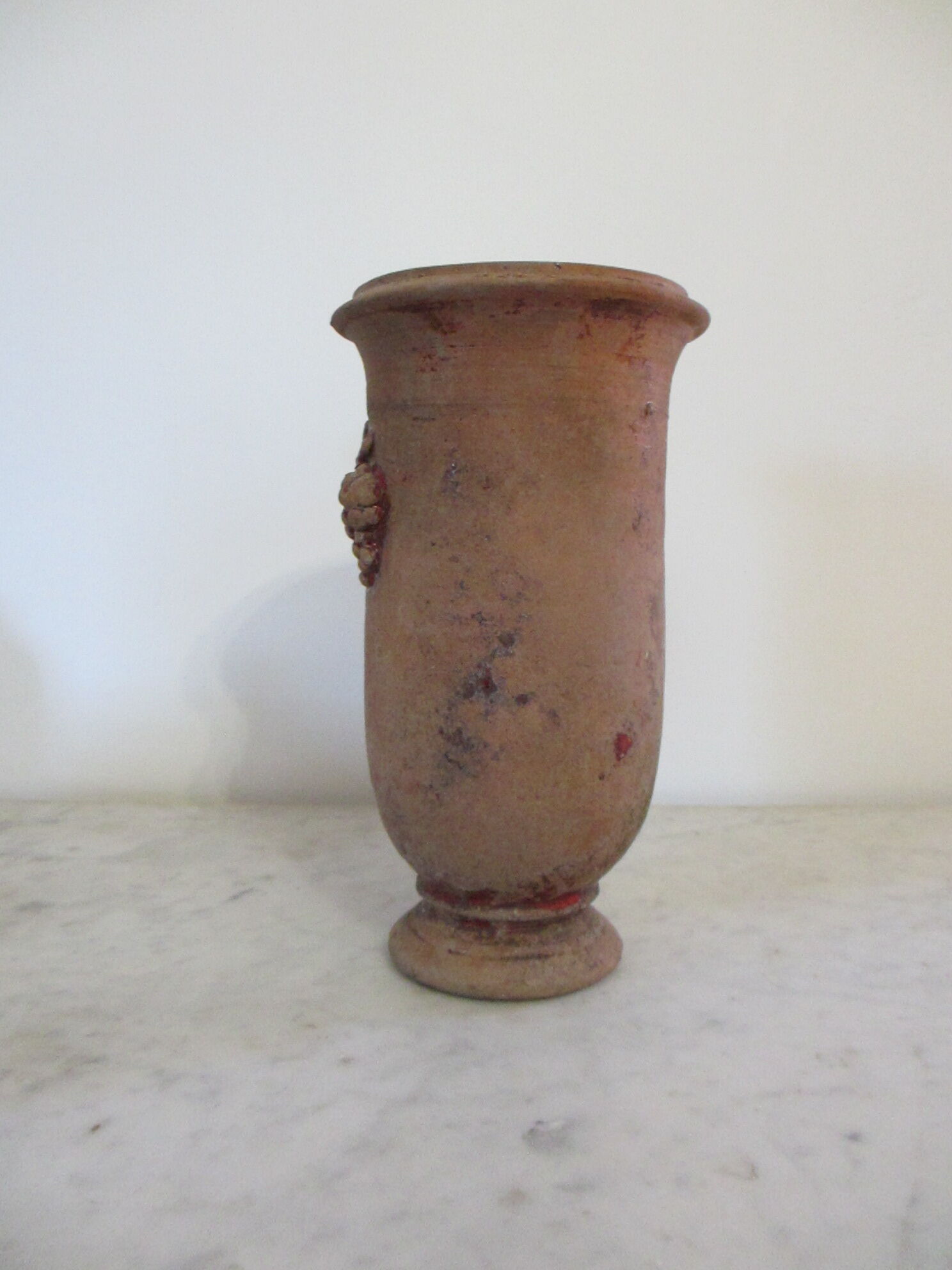 Terracotta vase . .