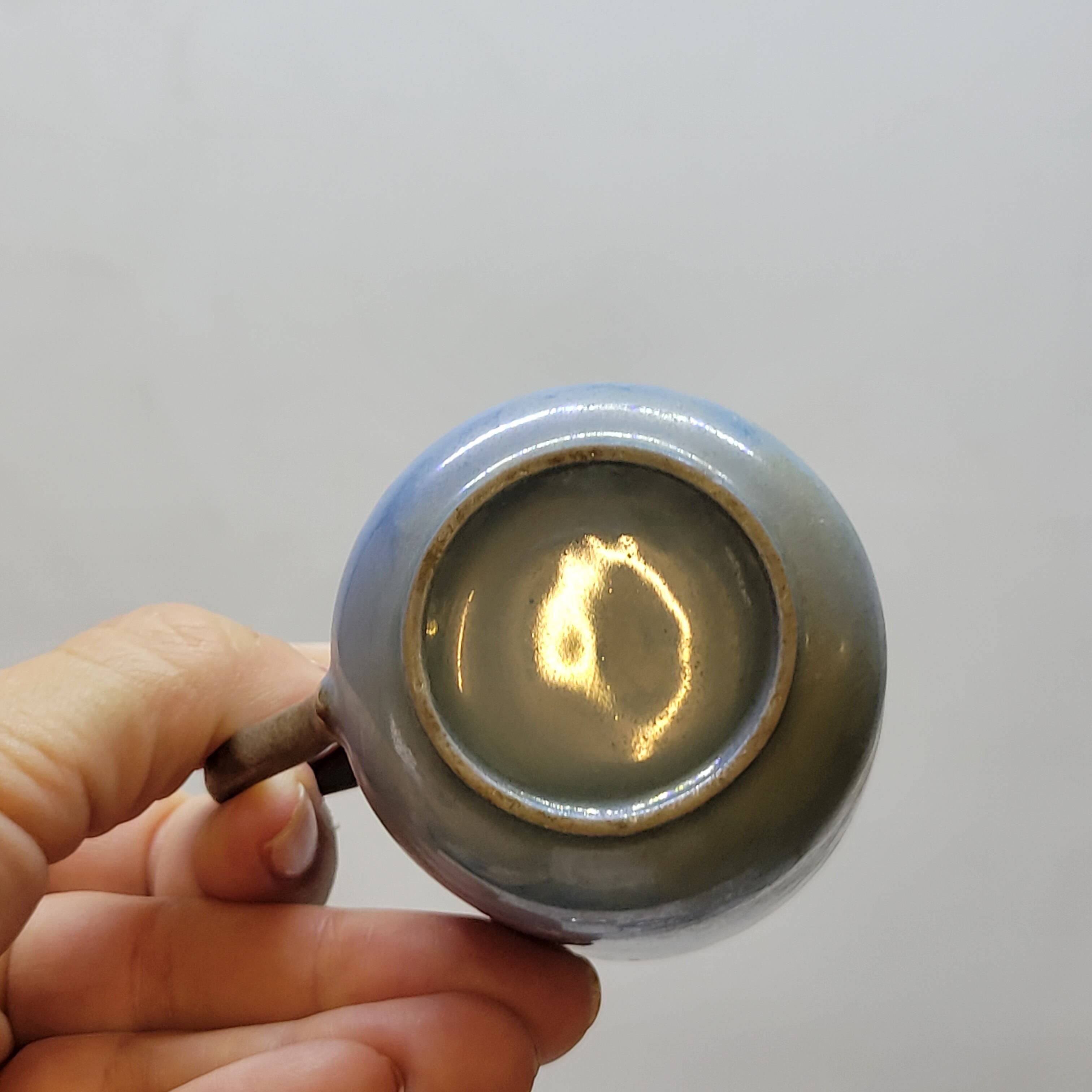 Art deco coffee service in fine iridescent blue porcelain, metal and wood