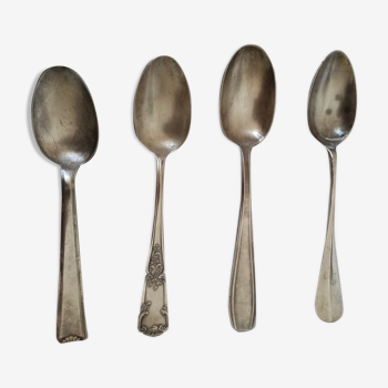 Large silver metal spoons