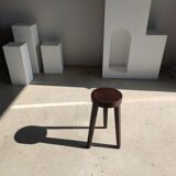 Small high tripod stool in brown solid wood