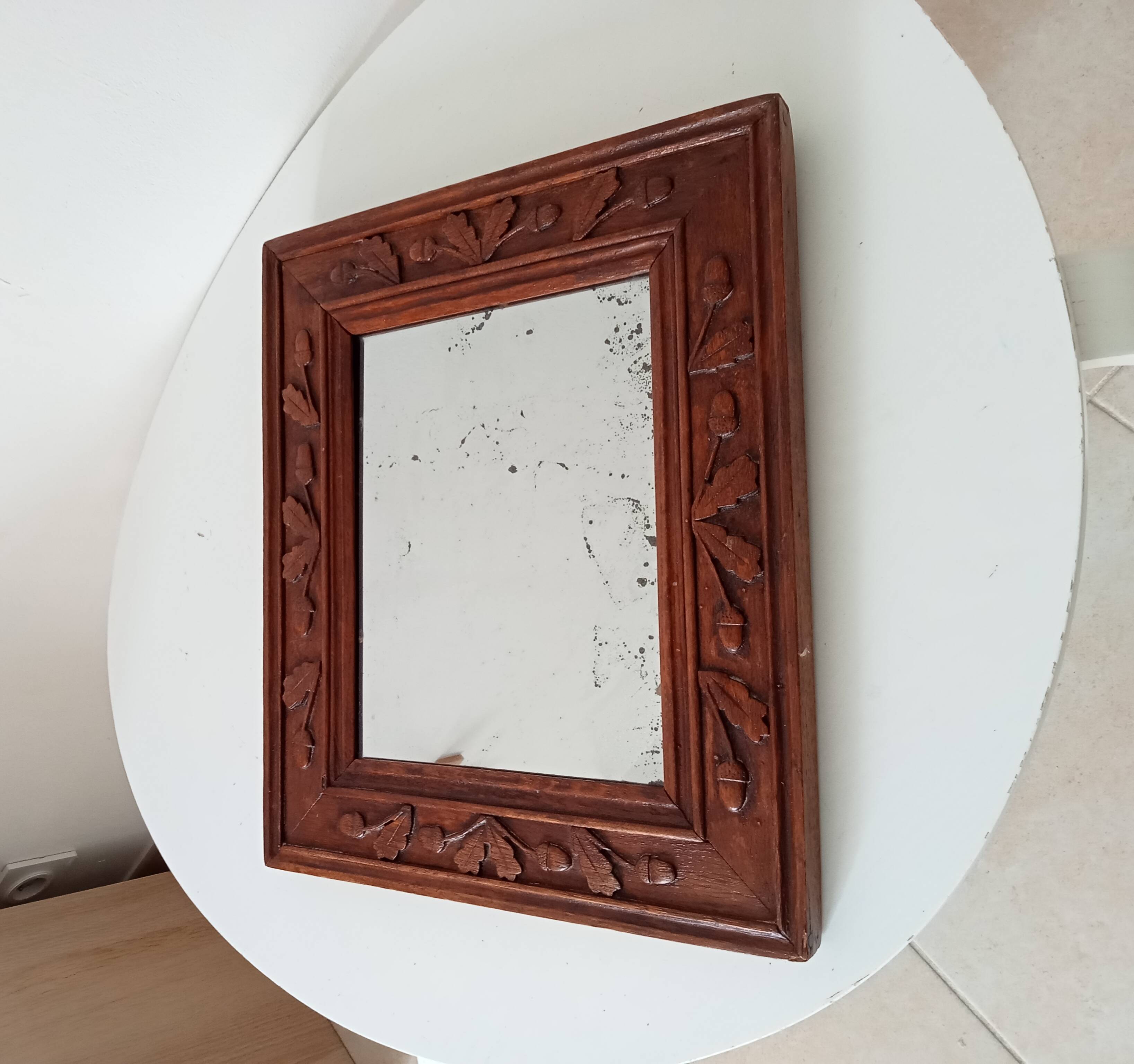 Antique mirror in carved wood