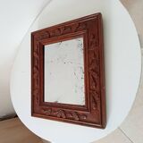 Antique mirror in carved wood