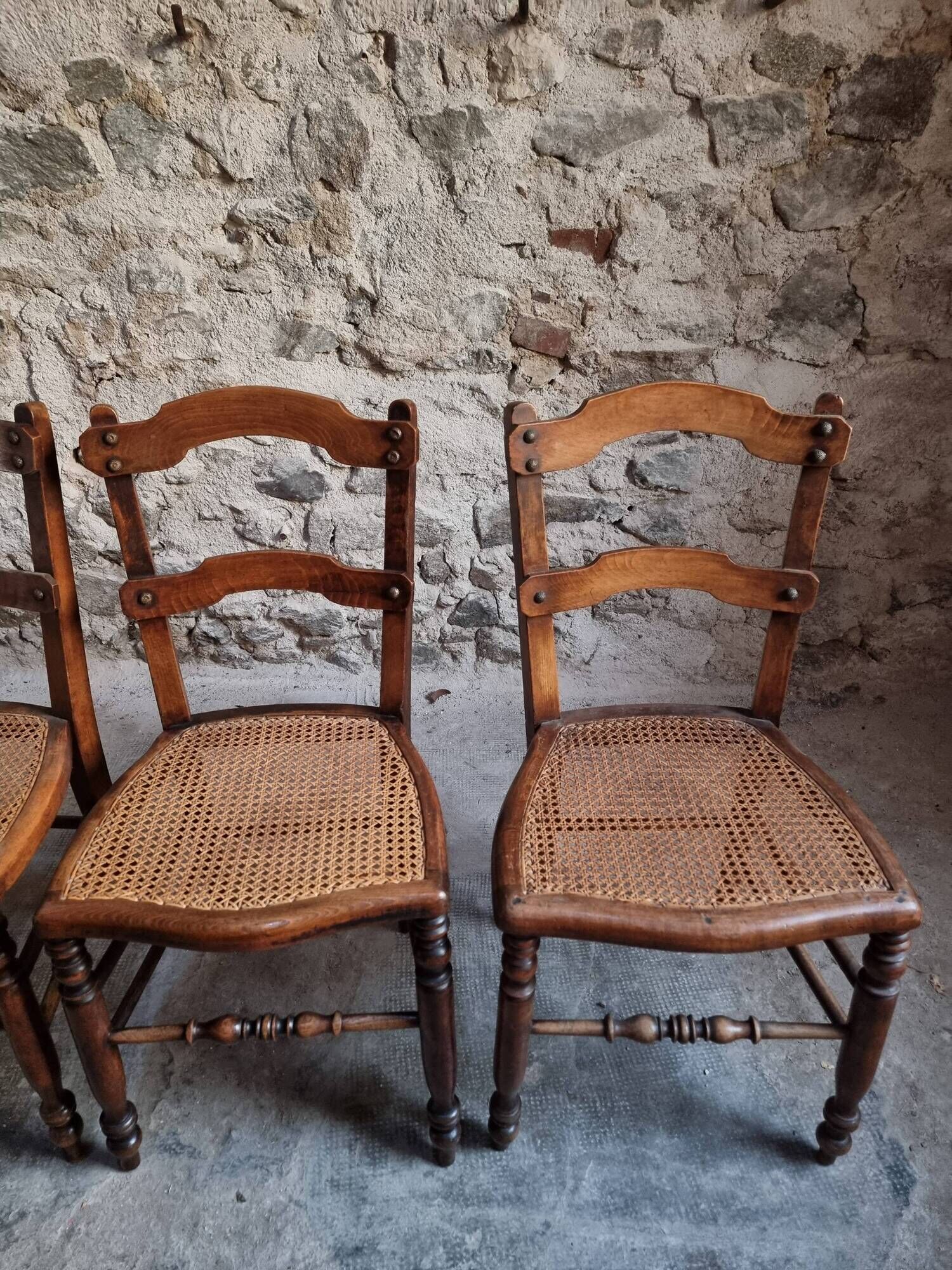 Set of 4 antique dining chairs with caned seats, beech, France, circa 1900–1920.