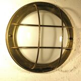 Brass "porthole" wall lamp