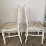 Set of 6 mismatched white chairs