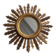 Sun mirror in old wood
